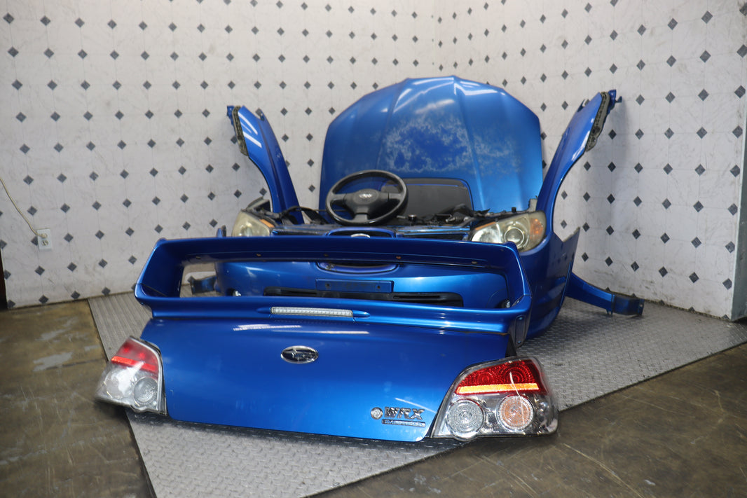 JDM 2006–2007 Subaru WRX STI Hawkeye Front-End Conversion – Blue WRX, HID Headlights, Aluminum Hood, Fenders & Bumper | JDM Seattle