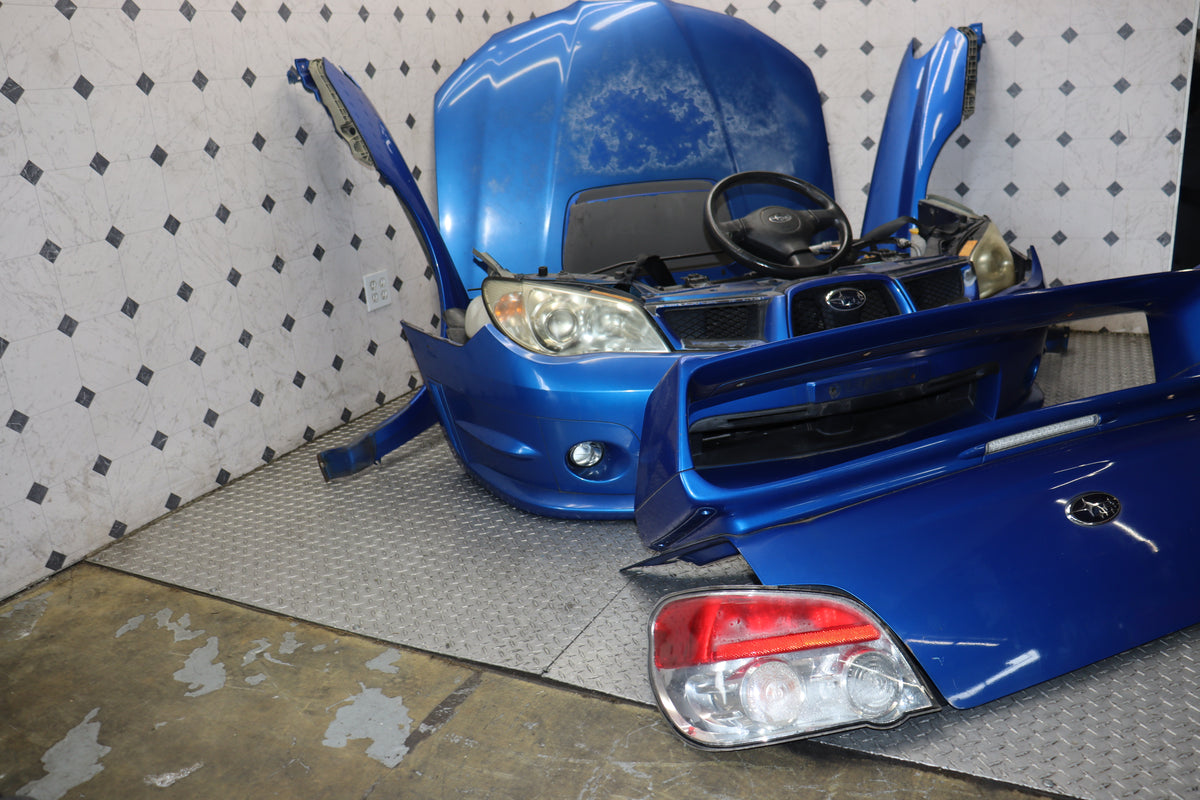 JDM 2006–2007 Subaru WRX STI Hawkeye Front-End Conversion – Blue WRX, HID Headlights, Aluminum Hood, Fenders & Bumper | JDM Seattle