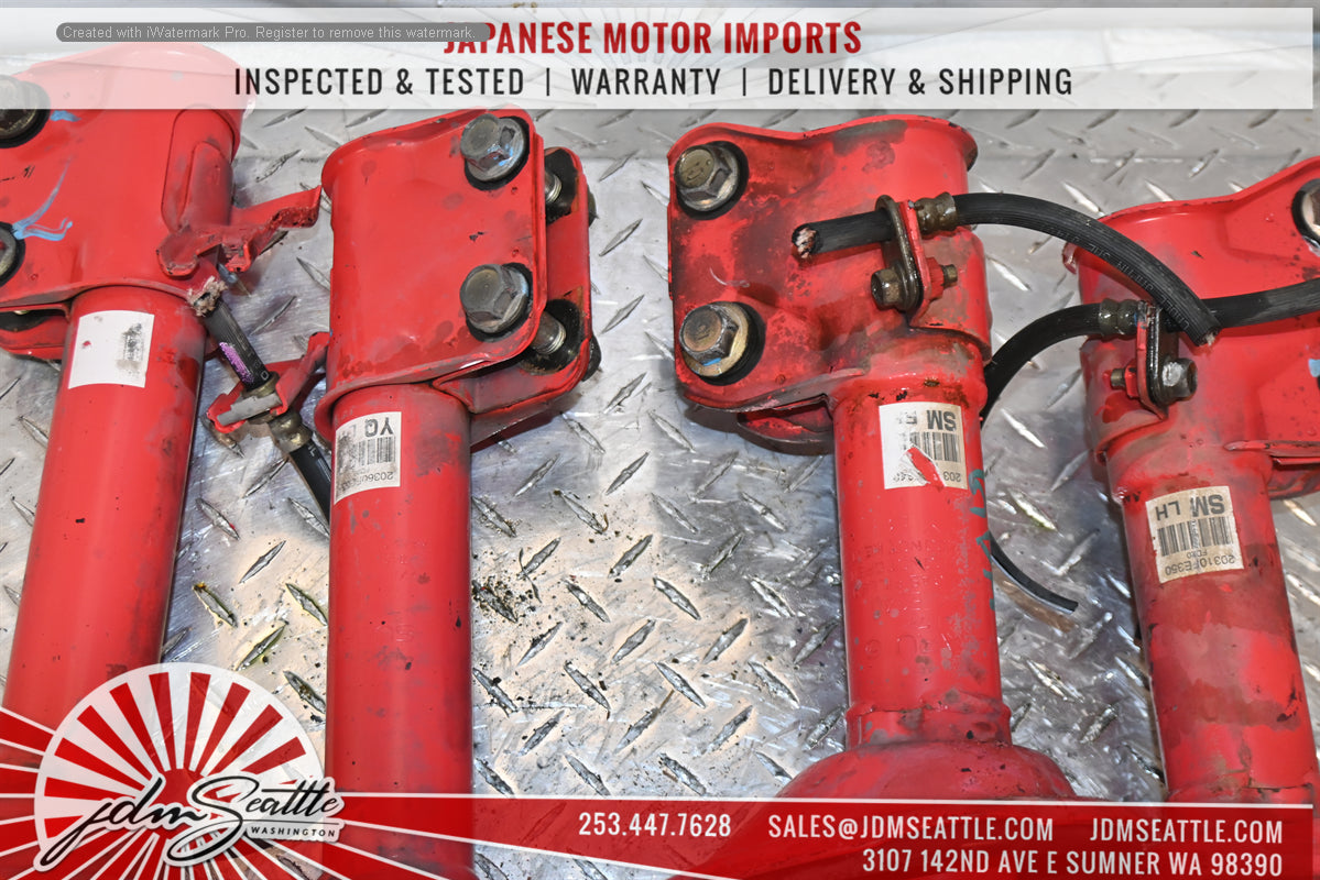 JDM 02-05 Subaru WRX STi OEM Struts Red W/ Black Springs